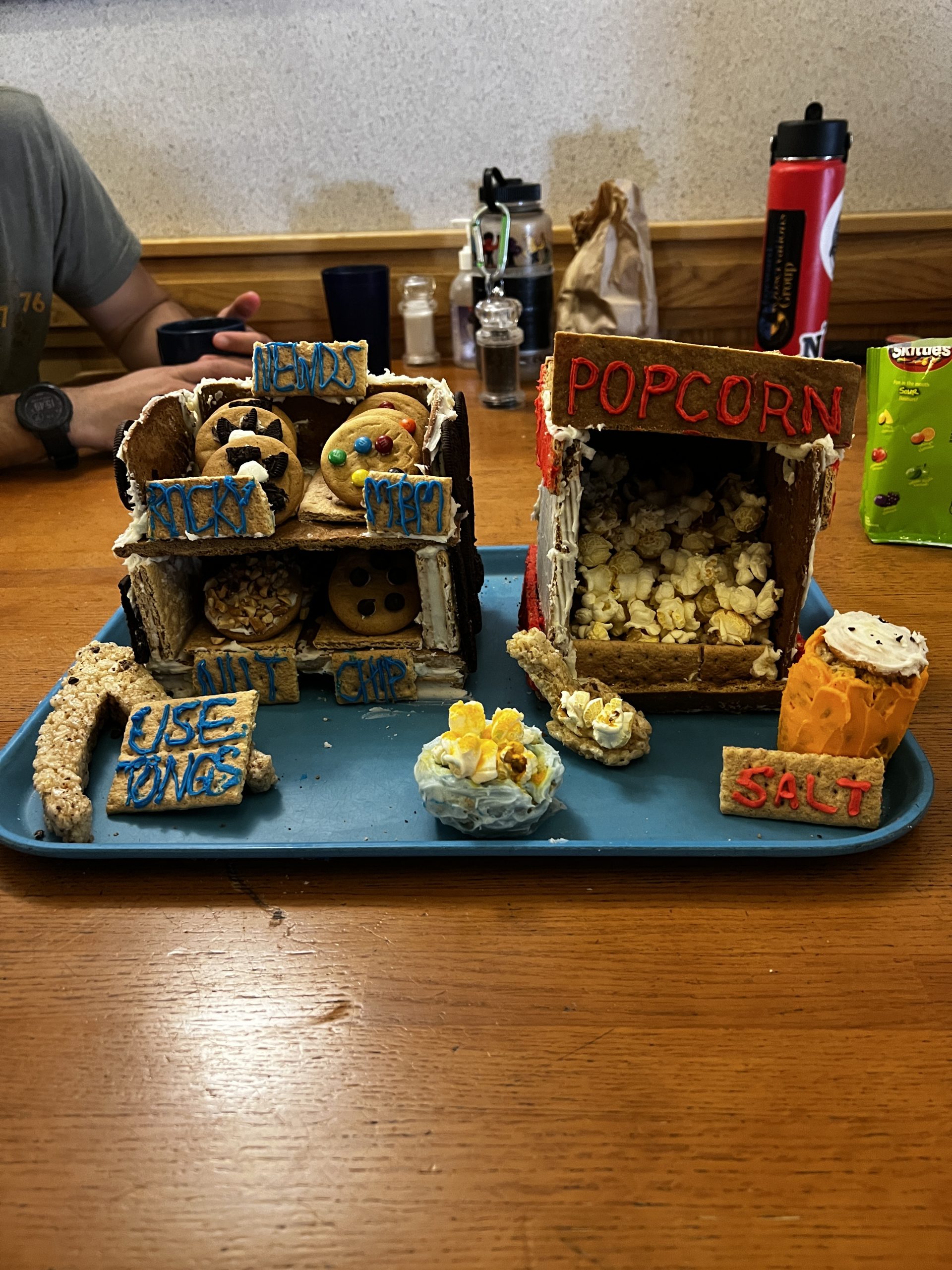 Gingerbread recreation of the cookie and popcorn stations