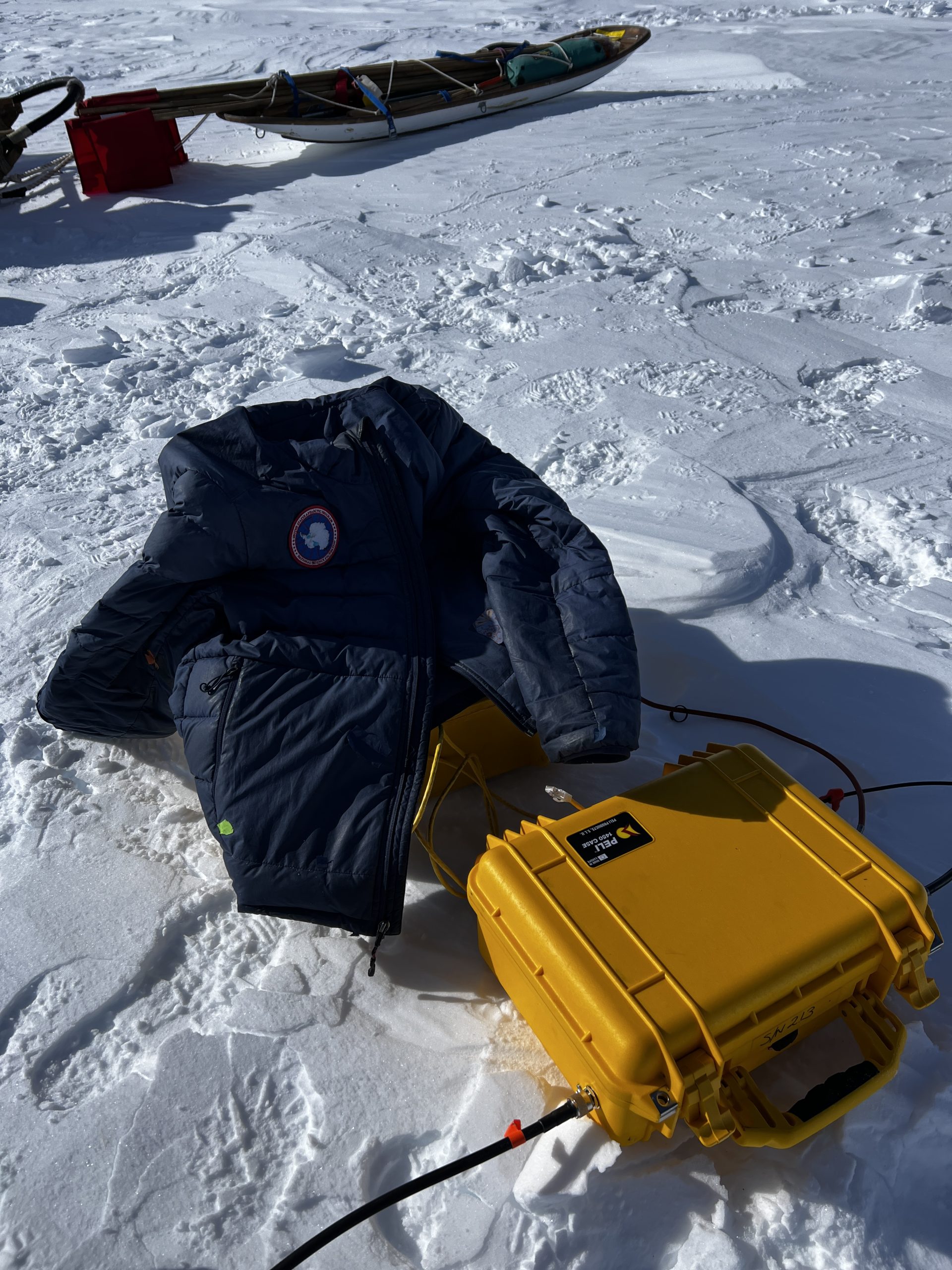 My puffy around the laptop to keep it warm