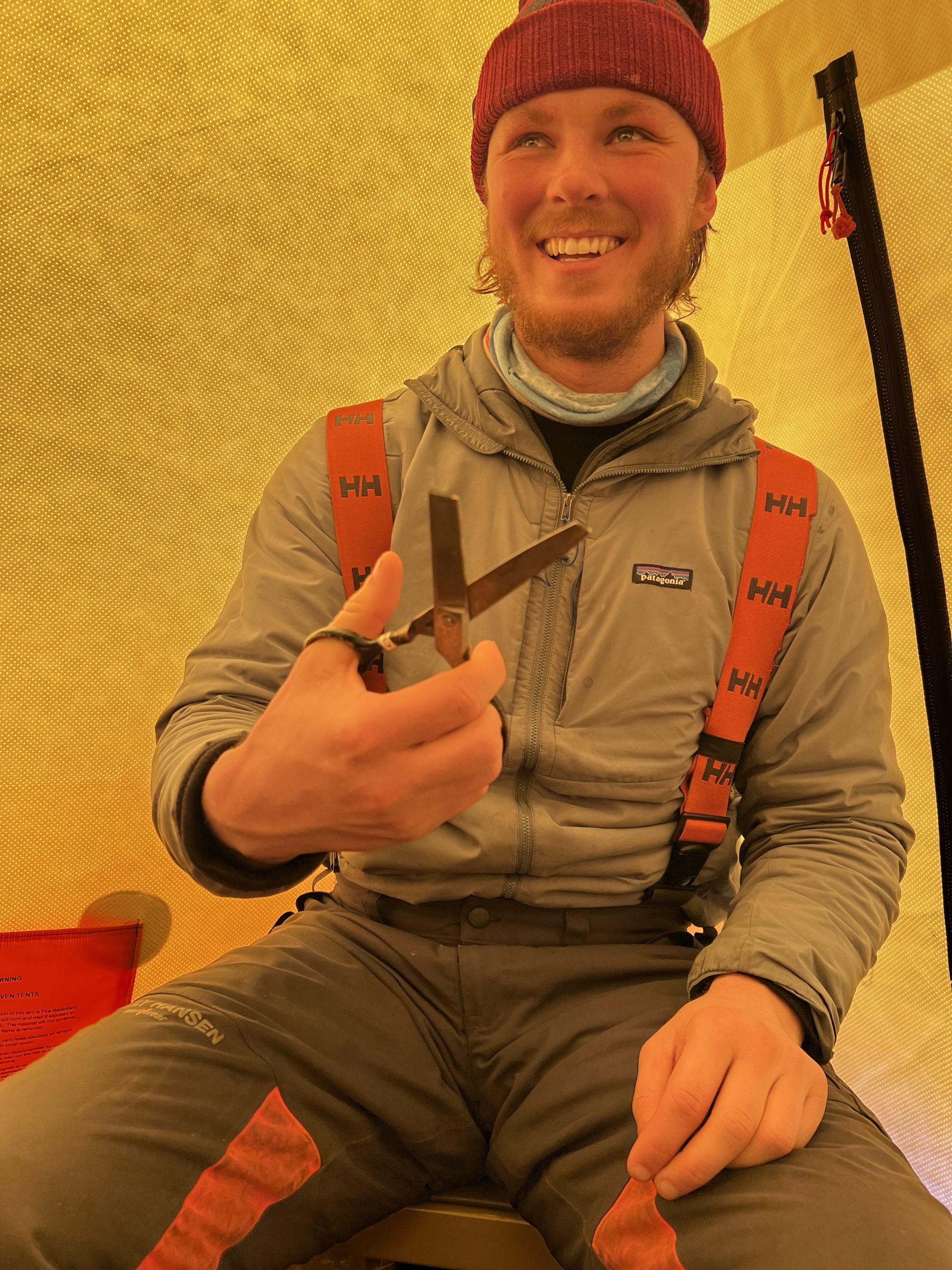 Elliot, holding a newly broken Cheri (scissors)