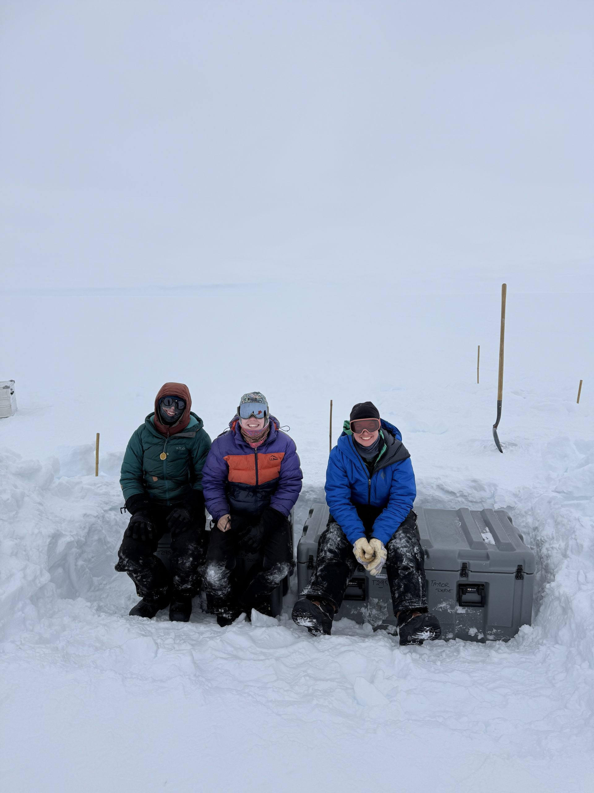 Naomi, Mary, and Ilyse sitting on top of two successfully installed 800 and 500 lb battery boxes! (photo by Dylen)