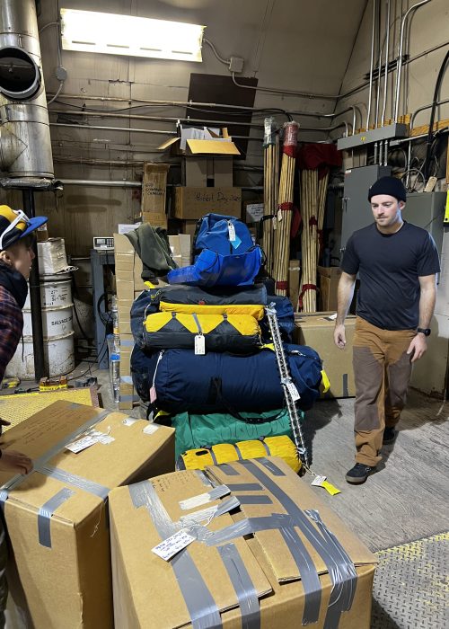 Forest and Ilyse moving cargo