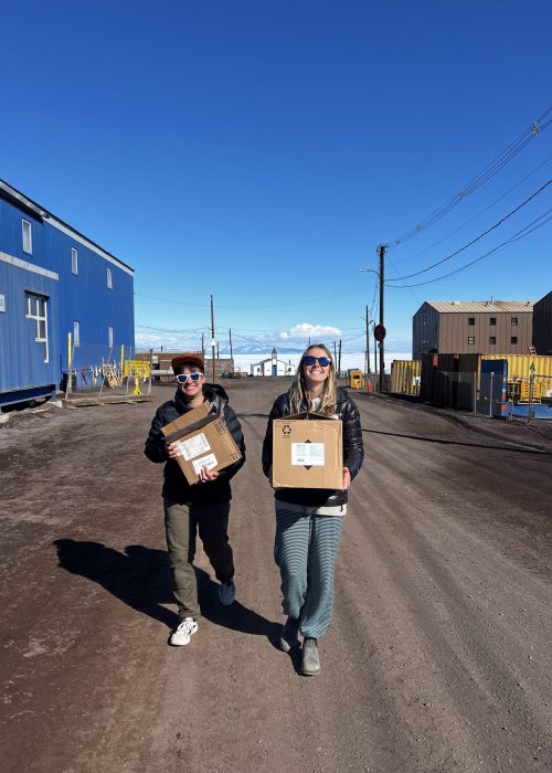 Ilyse and Dylen carrying Dylen's packages to the post office