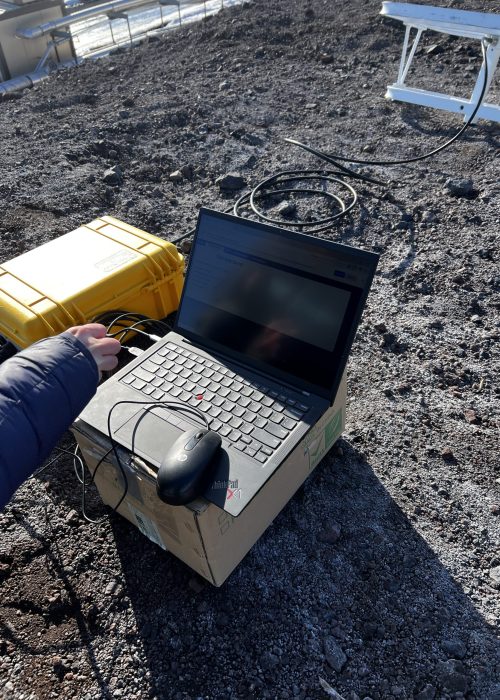 Ellen's frozen finger trying to operate a laptop while collecting ApRES data